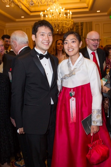 Lawrence Yang and L.J. Kwak wearing a traditional Korean cheongsam. (Drew Altizer/Asia Society)
