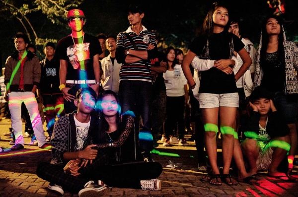 At dusk, in Yangon, a group of hip-hoppers wait for a concert to start. (Gilles Sabrié)