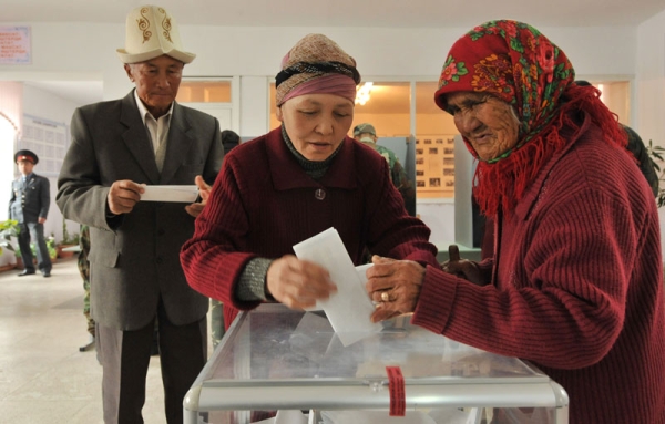 Kyrgyz women cast their votes at a polling station during the parliamentary elections in the village of Koy-Tash, some 15kms from Bishkek, on October 10, 2010. (Vyacheslav Oseledko/AFP/Getty Images) 