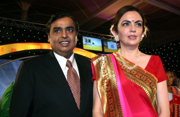 Indian industrialist Mukesh Ambani (L) poses with his wife Neeta Ambani at an awards ceremony in Mumbai on March 10, 2010. (STRDEL/AFP/Getty Images)