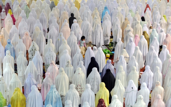 Indonesian women pray during the first night of Ramadan in Jakarta on August 10, 2010. The fasting month of Ramadan, which started on August 11, is the ninth month of the Muslim Hijri calendar, during which the faithful abstain from eating, drinking, smoking and having sex during daylight and, in the evening, eat small meals and conduct evening prayers. (Adek Berry/AFP/Getty Images)