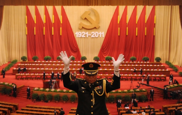 A Chinese military band practices inside the Great Hall of the People in Beijing before celebrations start for the Chinese Communist Party's 90th anniversary on July 1, 2011. (Peter Parks/AFP/Getty Images)