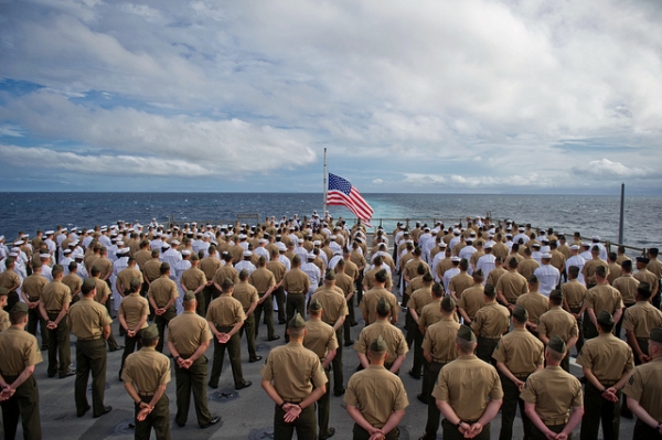 Marines with the 11th Marine Expeditionary Unit and sailors aboard USS Pearl Harbor stand in formation during a 70th anniversary commemoration ceremony of the attack on Pearl Harbor here Dec. 7. (Cpl. Tommy Huynh/U.S. Marine Corps/Flickr)