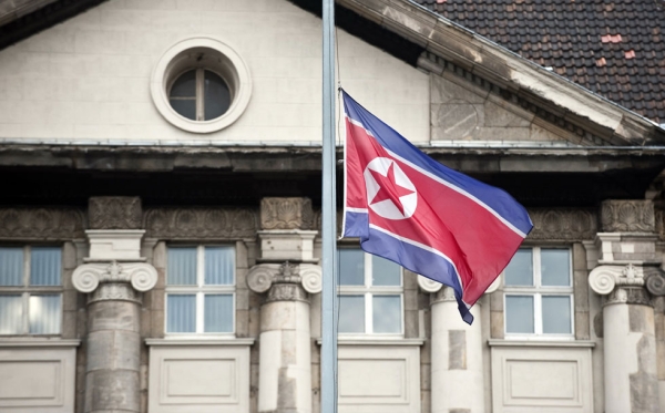 The flag of the Democratic Republic of Korea (DPRK) flies at half-mast in front of the embassy in Berlin December 19, 2011, following the death of North Korean leader Kim Jong Il.  (John MacDougall/AFP/Getty Images)