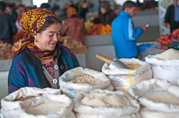 A woman sells grain in a bazaar in Ashkhabad, Turkmenistan on October 30, 2011. (Kerri-Jo/Flickr)