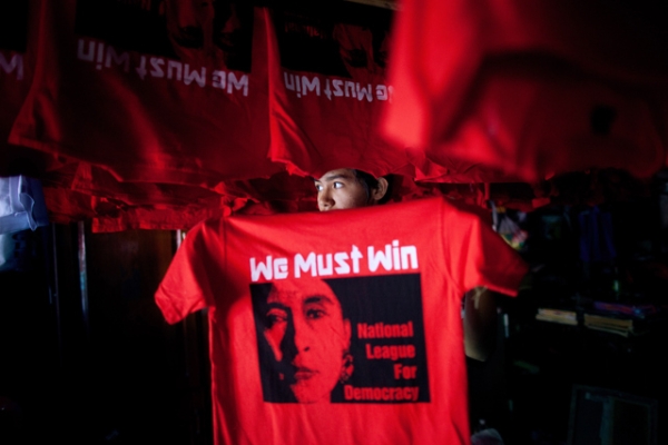 A Burmese worker hangs up freshly silkscreened National League for Democracy party (NLD) tshirt ahead of the parliamentary elections March 26, 2012 in Yangon, Myanmar. (Paula Bronstein/Getty Images)