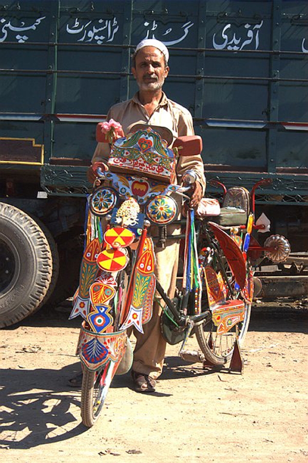 Other forms of public and private transportation in Pakistan such as buses, rickshaws and bicycles also get decorated in the same elaborate manner. (Peter Grant)