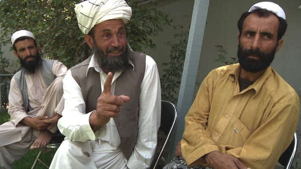 Village elders Akbar Khan, Lal Agha and Abdul Raham explain why Afghan locals in Logar province are attacking the China Metallurgical Group Corporation compound. (Brent Huffman)