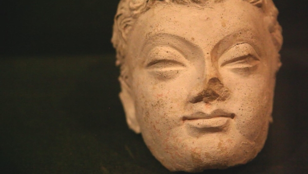 A head sculpted in the Gandhara style. (Brent Huffman)