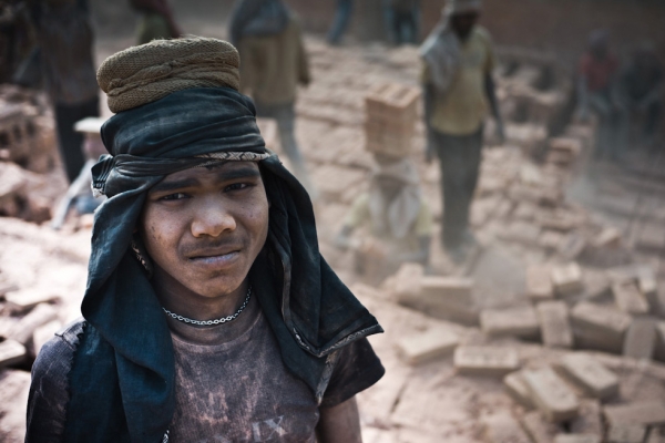 A young worker at one of many brick factories on the outskirts of Kathmandu. (Garry Waller)