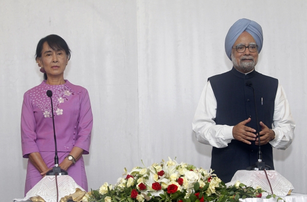 India's Prime Minister Manmohan Singh (R) addresses reporters during a joint press conference following his meeting with Myanmar opposition leader Aung San Suu Kyi at a hotel in Yangon on May 29, 2012. (Soe Zeya Tun/AFP/GettyImages)