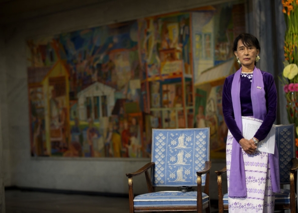 Myanmar democracy icon Aung San Suu Kyi looks on before delivering her Nobel speech during the Nobel ceremony at Oslo's City Hall on June 16, 2012. (Daniel Sannum-Lauten/AFP/Getty Images)