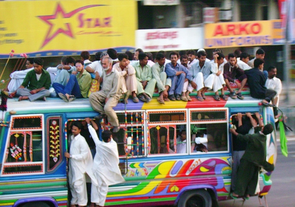 A colorful truck speeds down a Karachi street. (Ejaz Asi/Flickr)
