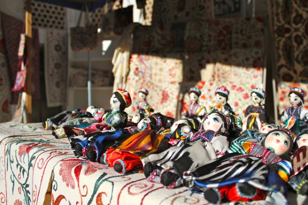 A row of handmade dolls line a market stall in Bukhara, Uzbekistan on October 1, 2012. (erh1103/Flickr)