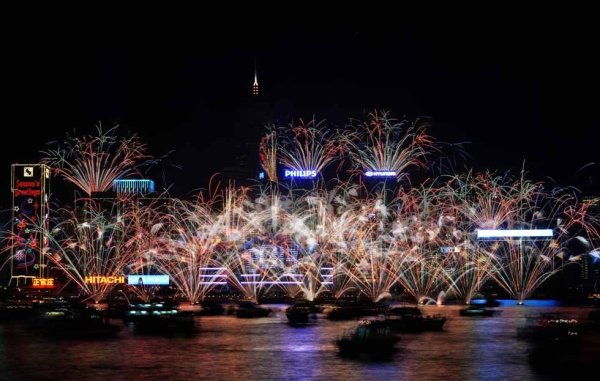 Fireworks explode over Victoria Harbor to celebrate the new year in Hong Kong on January 1, 2013. (Anthony Dickson/AFP/Getty Images)