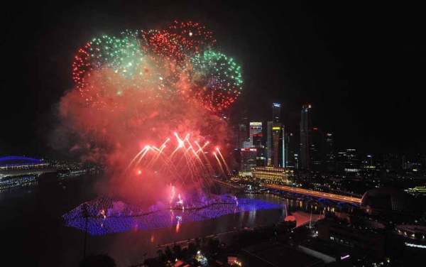 Fireworks illuminate the sky to usher in the new year at the Marina Bay in Singapore on January 1, 2013. (Roslan Rahman/AFP/Getty Images)