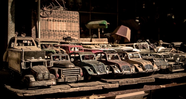 A row of vintage toy cars neatly lined up in an antique market stall in Shanghai, China on January 27, 2013. (ciaocibai/Flickr)