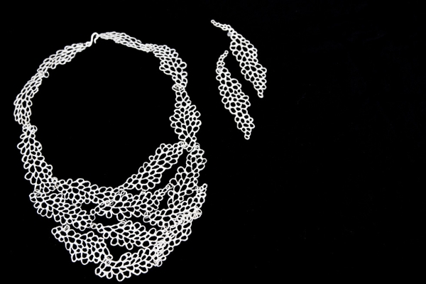 Scales Necklace, sterling silver with Scales Earrings, sterling silver. (Philippe Chery/Asia Society)