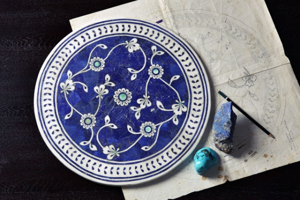 Peshawar-based company LEL works to preserve pietra dura, the art of handcrafted stone inlay, adhering to ancient techniques but with contemporary innovations. Above: Iznik filigree tabletop. (Omer Gilani@Happa Studio)