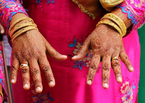 Traditional henna adorns a woman's hand in Singapore on September 2, 2013. (Edelman APACMEA/Flickr)
