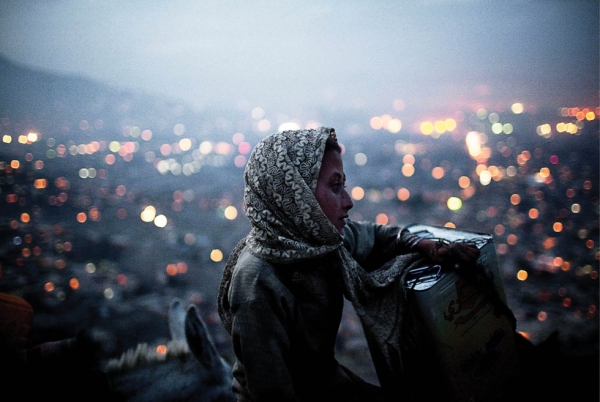 Kabul, 2009: A young Afghan girl atop one of the major hills over looking the city.  (Jared Moossy/Redux Pictures)