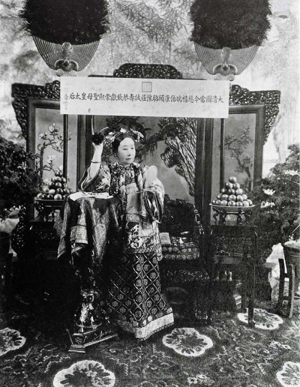 Empress Cixi (1835-1908), shown here putting a flower in her Manchu-style coiffure, is the subject of Jung Chang's new biography Empress Dowager Cixi. (Freer Sackler Gallery Archives)