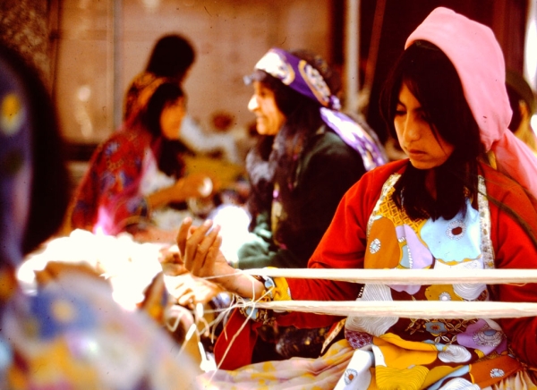 A nomad lady hand-spinning wool.