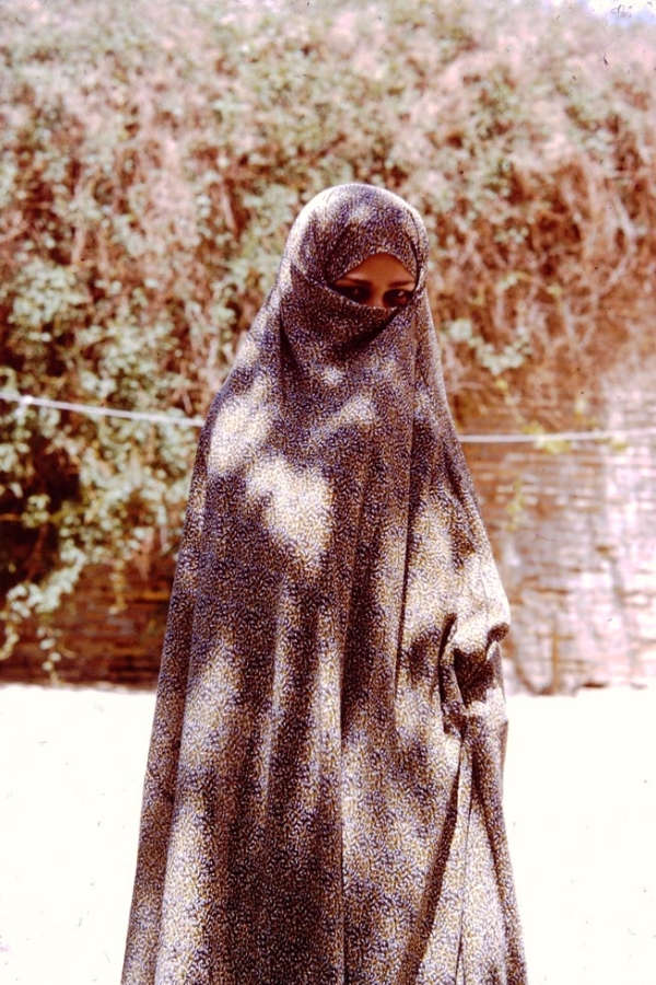 A young Persian girl in her chador.