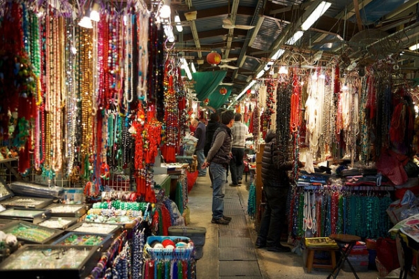 A market street full of glittering jewelry stalls awaits customers in Hong Kong on January 1, 2014. (Luca Mascaro/ Flickr)