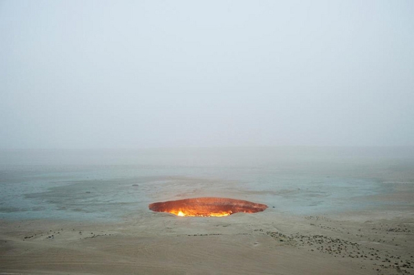 Dubbed "The Door to Hell," a natural gas field provides constant fuel for flames in Derweze, Turkmenistan ON December 27, 2013. (gafa kassim/ Flickr) 