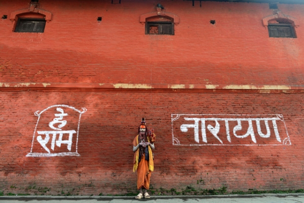 A Hindu sadhu (holy man) poses near the Pashupatinath Temple in Kathmandu, Nepal on January 30, 2014. (Prakash Mathema/AFP/Getty Images)