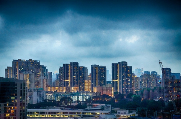 Dark and stormy clouds gather over Singapore's skyline on August 29, 2014. (Eustaquio Santimano/Flickr)