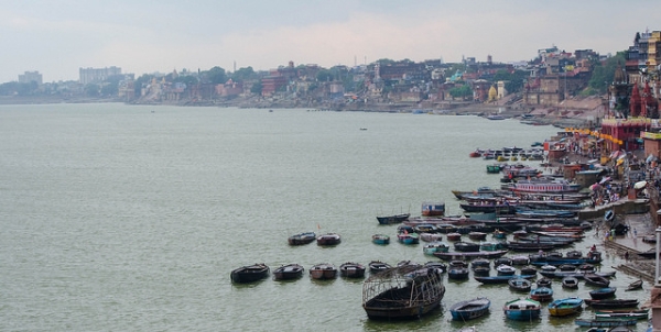 A variety of boats float in the vast waters of Varanasi on October 14, 2014. (ColWoods/Flickr)