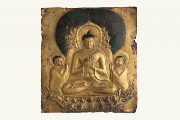 Plaque with image of seated Buddha; Pagan period, 11th–13th century; Gilded metal with polychrome; H. 7 x W. 61/4 x D. 1/4 in. (17.8 x 15.9 x 0.6 cm). Bagan Archaeological Museum. (Sean Dungan)