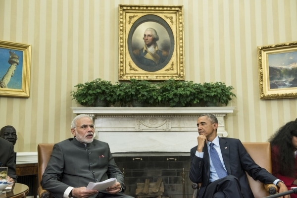 Indian Prime Minister Narendra Modi (L) makes a statement to the press as U.S. President Barack Obama listens after a meeting in the Oval Office of the White House on September 30, 2014. (Brendan Smialowski/Getty Images)