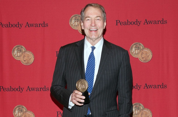 Television journalist Charlie Rose holds the Peabody Award he won for his "One-on-One with Assad" interview on May 19, 2014 in New York City. (Peabody Awards/Flickr)