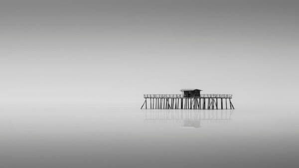 A house built for fishermen stands alone in the middle of the sea in Port Dickson, Negeri Sembilan, Malaysia. Photograph by Jefflin Ling. (Smithsonian.com)