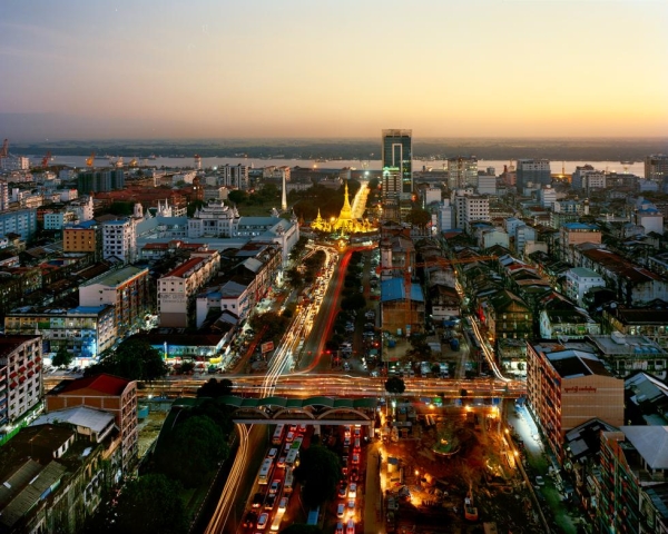Myanmar: Yangon's Sule Pagoda at dusk, as seen from Trader's Hotel (now the 'Sule Shangri-la'). (Andrew Rowat)