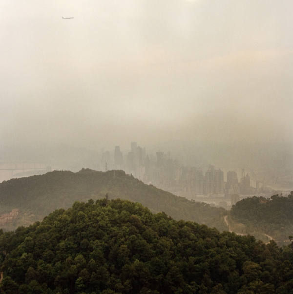 From a vantage point on top of Nanshan, the green hillsides and the cityscape appear to exist symbiotically. In fact, the terrain in the urban part of Chongqing keeps development concentrated to a relatively small area. (Tim Franco)