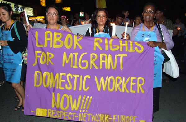 Filipino domestic workers attend a demonstration for migrant laborer rights. (ILO in Asia and the Pacific/Flickr)
