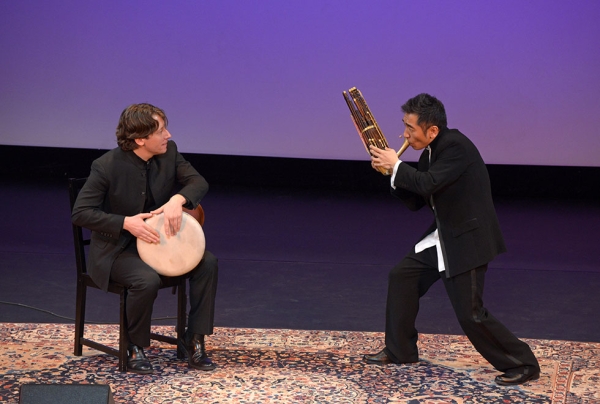 Wu Tong, a founding member of the Silk Road Project ensemble, dazzles an Asia Society crowd in New York on March 19, 2015 with his virtuosity on the sheng, a traditional Chinese wind instrument. He is joined onstage by Shane Shanahanon on vibraphone and percussion. (Elsa Ruiz/ Asia Society)