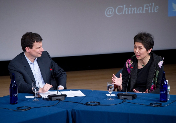 On December 17, ChinaFile invited five New Yorker writers that have covered China through the years — Orville Schell, Peter Hessler, Evan Osnos, Zha Jianying, and Jiayang Fan — for a look back at their four decades of reporting on China for the magazine. In this photograph, Zha Jianying speaks while moderator David Remnick, The New Yorker's editor, looks on. (Elena Olivo/ Asia Society)