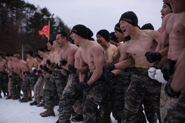 South Korean and U.S. soldiers shout during a joint annual winter exercise in Pyeongchang, South Korea on January 28, 2016. (Ed Jones/AFP/Getty) 