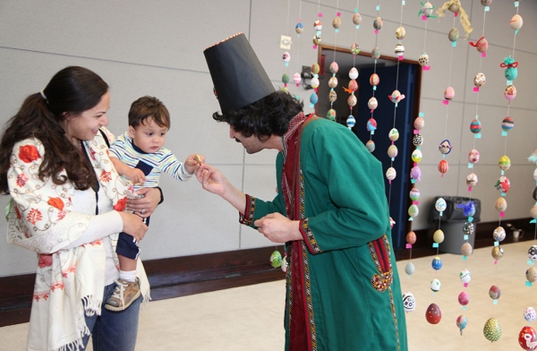 Both kids and adults enjoy an array of crafts and educational workshops celebrating Nowruz on March 12, 2016. (Ellen Wallop/Asia Society)