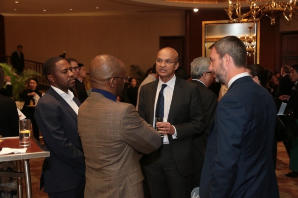 From left to right: guest; Strive Masiyiwa, Asia Society Trustee; Omar Ishrak, Asia Society Trustee; and guest.
