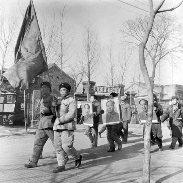 A group of Chinese Red Guards shout slogans while parading with portraits of Mao Zedong on January 21, 1967 in downtown Beijing. Their aim was to arouse townspeople and villagers to recapture the victorious 1949 revolutionary zeal, and ferret out those who have departed from Mao's ideals. (Jean Vincent/AFP/Getty Images)