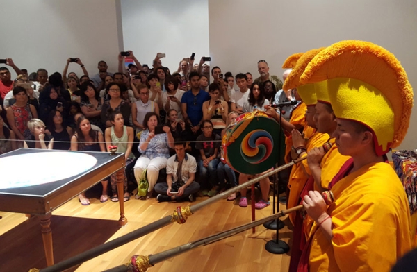 A closing ceremony on August 23, 2015, is marked with a performance of music and chants marks the end of construction of the sand mandala. (Tiffany Chen/Asia Society)