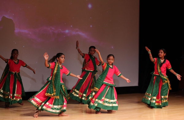 Celebrants are entertained and educated as performers teach the stories and mythology behind Indian folk dance in New York on October 15, 2016. (Ellen Wallop/Asia Society)