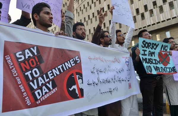 Pakistani men protest against Valentine's Day celebrations in Karachi on February 12, 2017. The holiday is increasingly popular among younger Pakistanis, many of whom have taken up the custom of giving cards, chocolates, and gifts to their sweethearts to celebrate the occasion. But many conservatives in the predominantly Muslim nation disapprove of the holiday as a Western import. This year, the Islamabad High Court in Pakistan's capital went so far as to issue an order banning the celebration of Valentine'