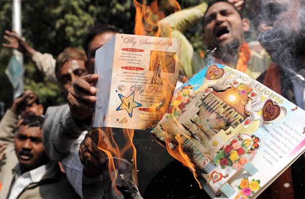 Activists of the Hindu party Shiv Sena burn cards during an anti-Valentine's Day protest in New Delhi on February 13, 2009. (Manan Vatsyayana/AFP/Getty)
